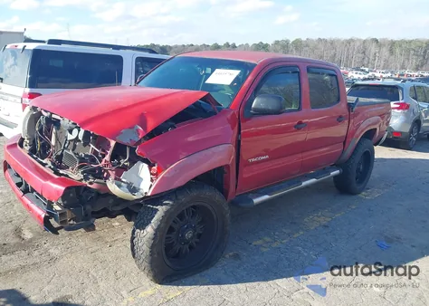 2011 Toyota Tacoma Base V6 z USA, uszkodzony, nr VIN 3TMLU4ENXBM068836